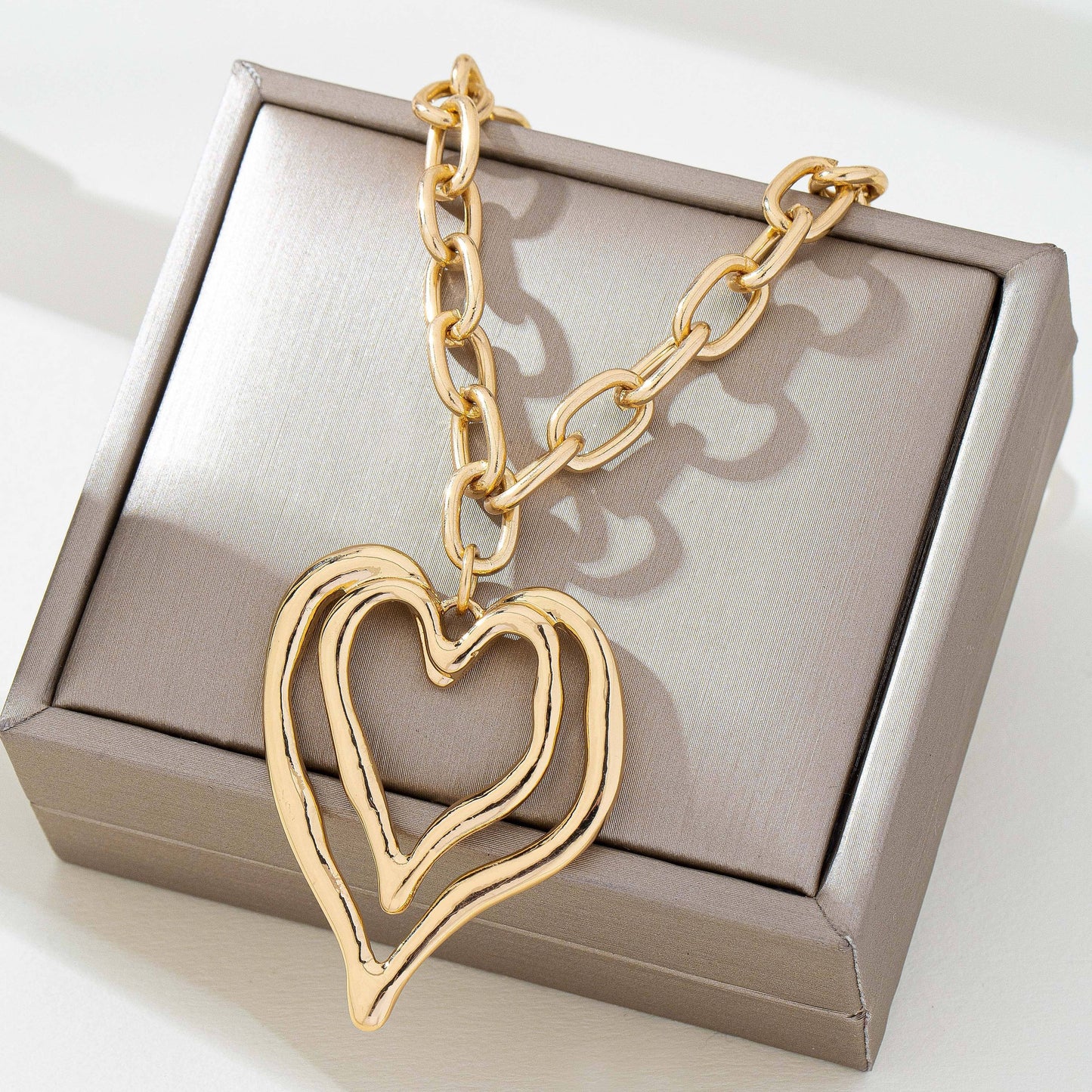 Sculptural Oversized Double Heart Pendant Necklace |80N93012