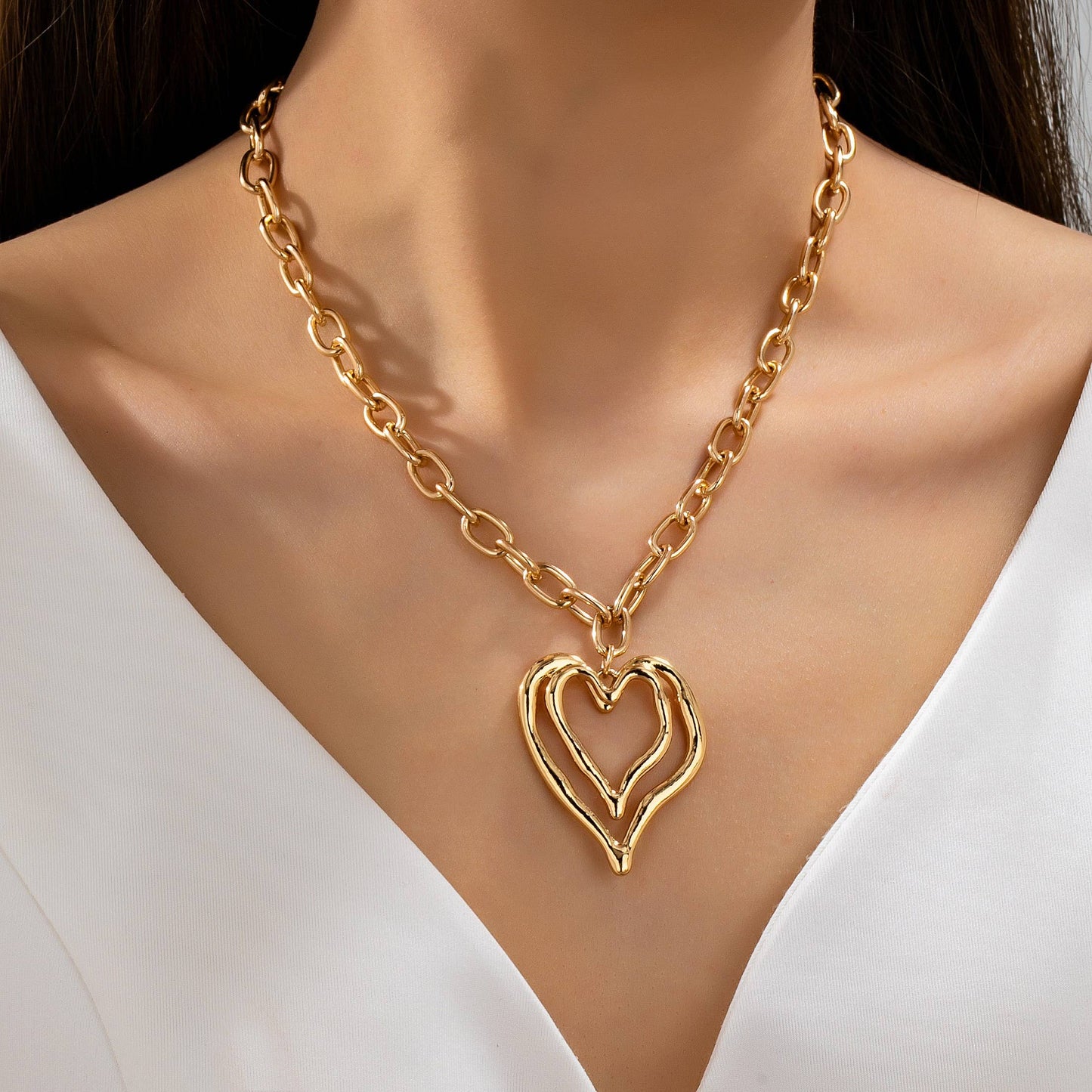 Sculptural Oversized Double Heart Pendant Necklace |80N93012